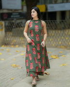 Sleeveless olive green kurti with red leaf print paired with matching palazzo pants.