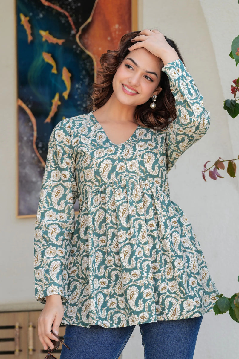 Green and cream paisley printed long kurti top with flared hem and long sleeves.