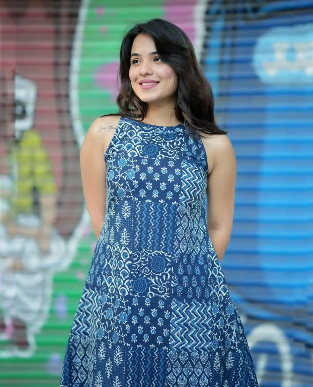 Blue printed sleeveless kurti with round neckline and matching palazzo pants.