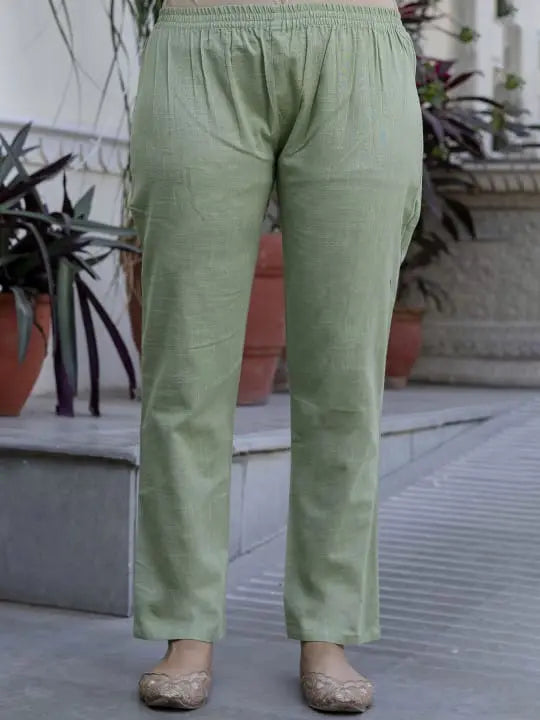 Light green straight-leg kurta pants with an elastic waistband and subtle texture.