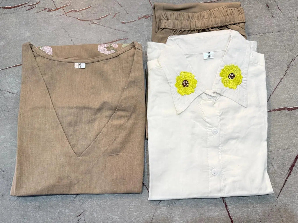 Beige folded corset top paired with white corset top featuring yellow floral embroidery.