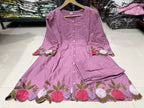 Lavender cotton kurta with floral embroidery on sleeves and hem, paired with matching pants.