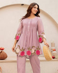 Lavender cotton kurta with pink floral embroidery on hem and cuffs paired with matching straight pants.