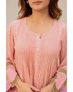 Peach cotton kurta with vertical pleats, round neckline, button-front, and floral embroidered sleeves.